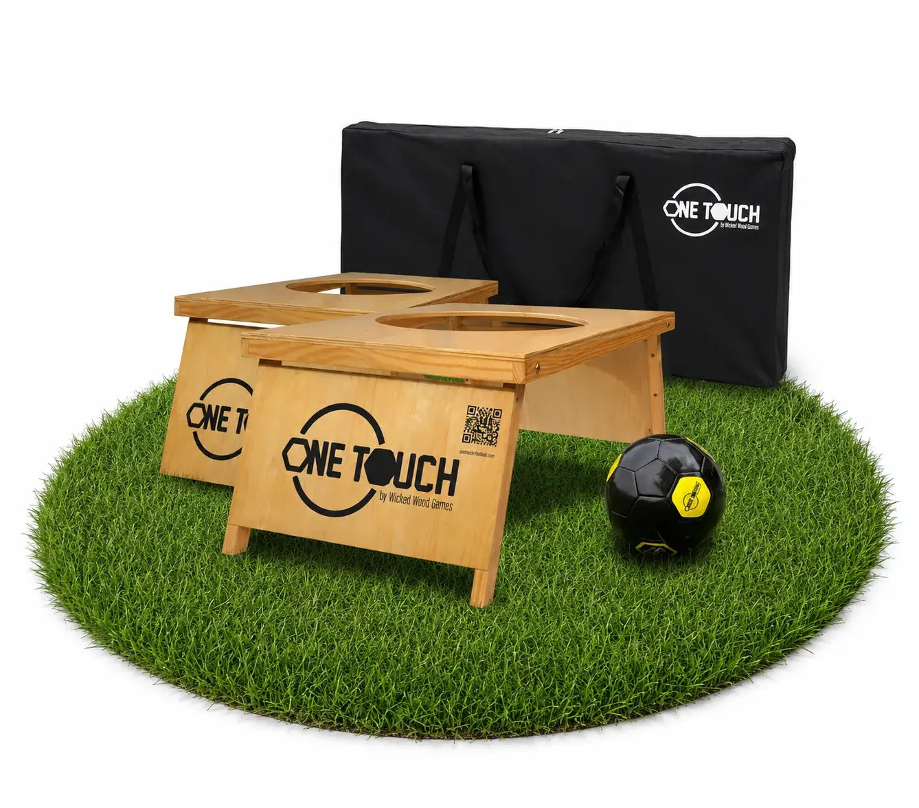 One touch football game two goals and a carryingbag for the game standing on a patch of green grass. made from wood. 
